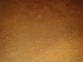 Grundierte Steine, Sand und Acryl auf Malervlies